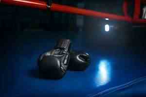 Black gloves on the ring, boxing concept, nobody