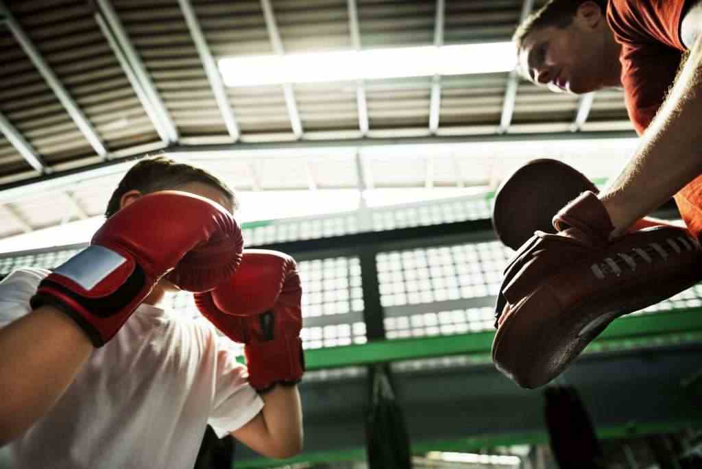 Boy Boxing Training Punch Mitts Exercise Concept