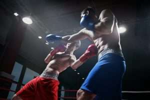 Fighting in boxing ring