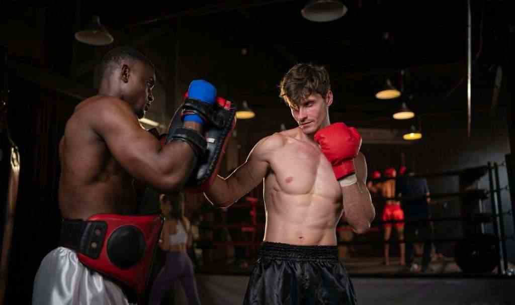 Two foreign boxers are practicing Muay Thai. to prepare for the real fight on stage,