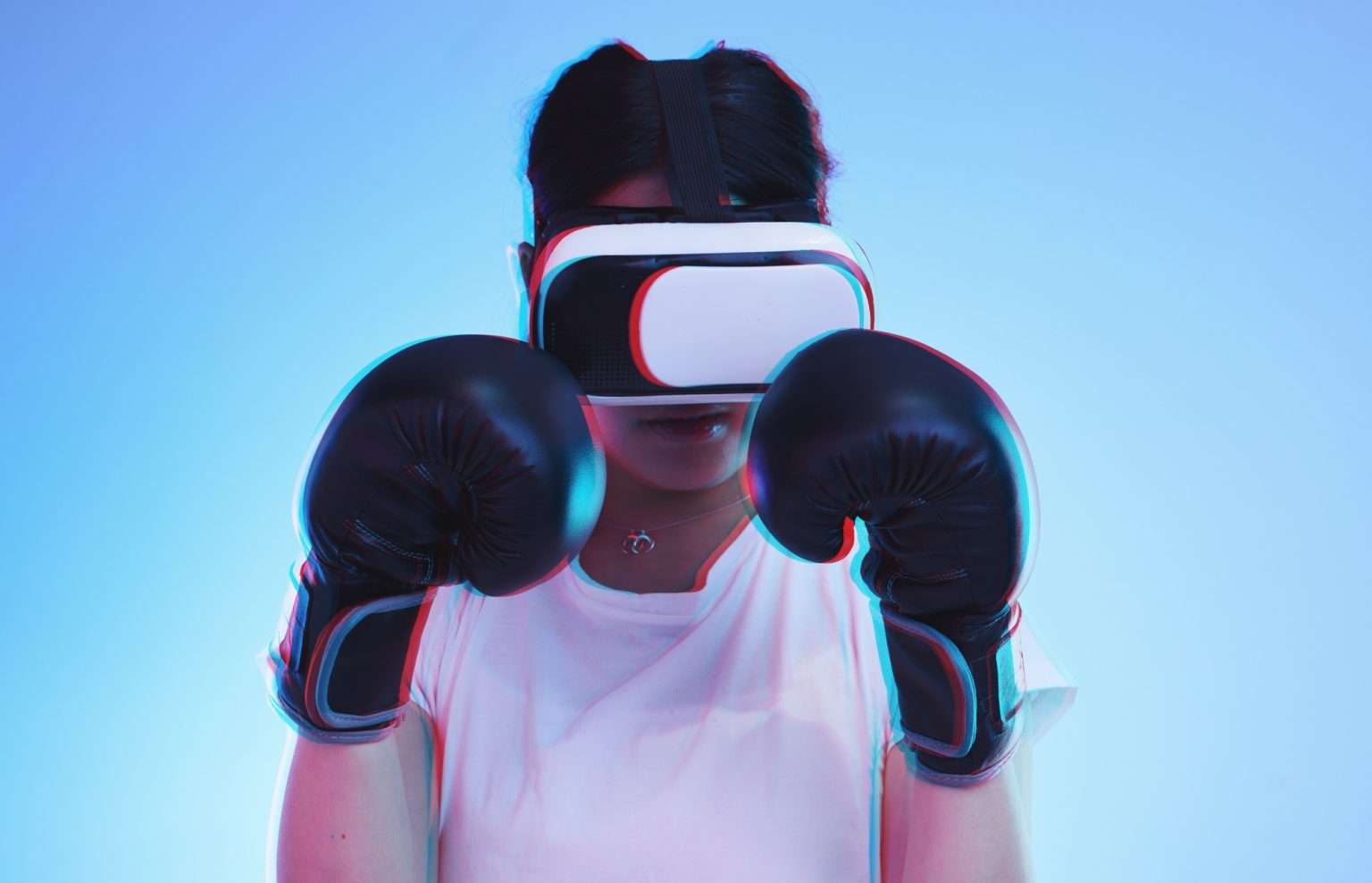 AI, metaverse and a boxer woman gaming on a blue background in studio for fitness or exercise. Virt