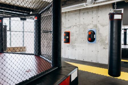 Gym for boxing with a ring, punching bag and other equipment