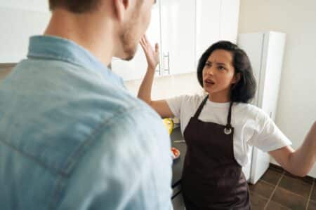 Dennis Buzukja suspendu et sanctionné après une altercation à l’UFC 310 Irritated young female having altercation with man