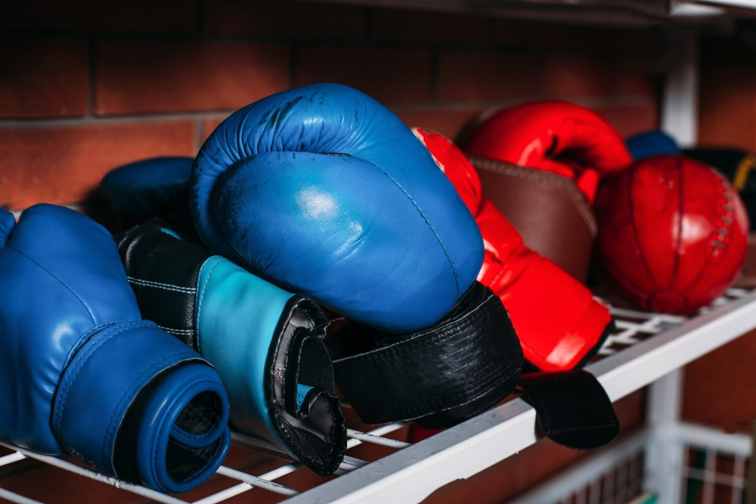 Boxing gloves on the shelf.